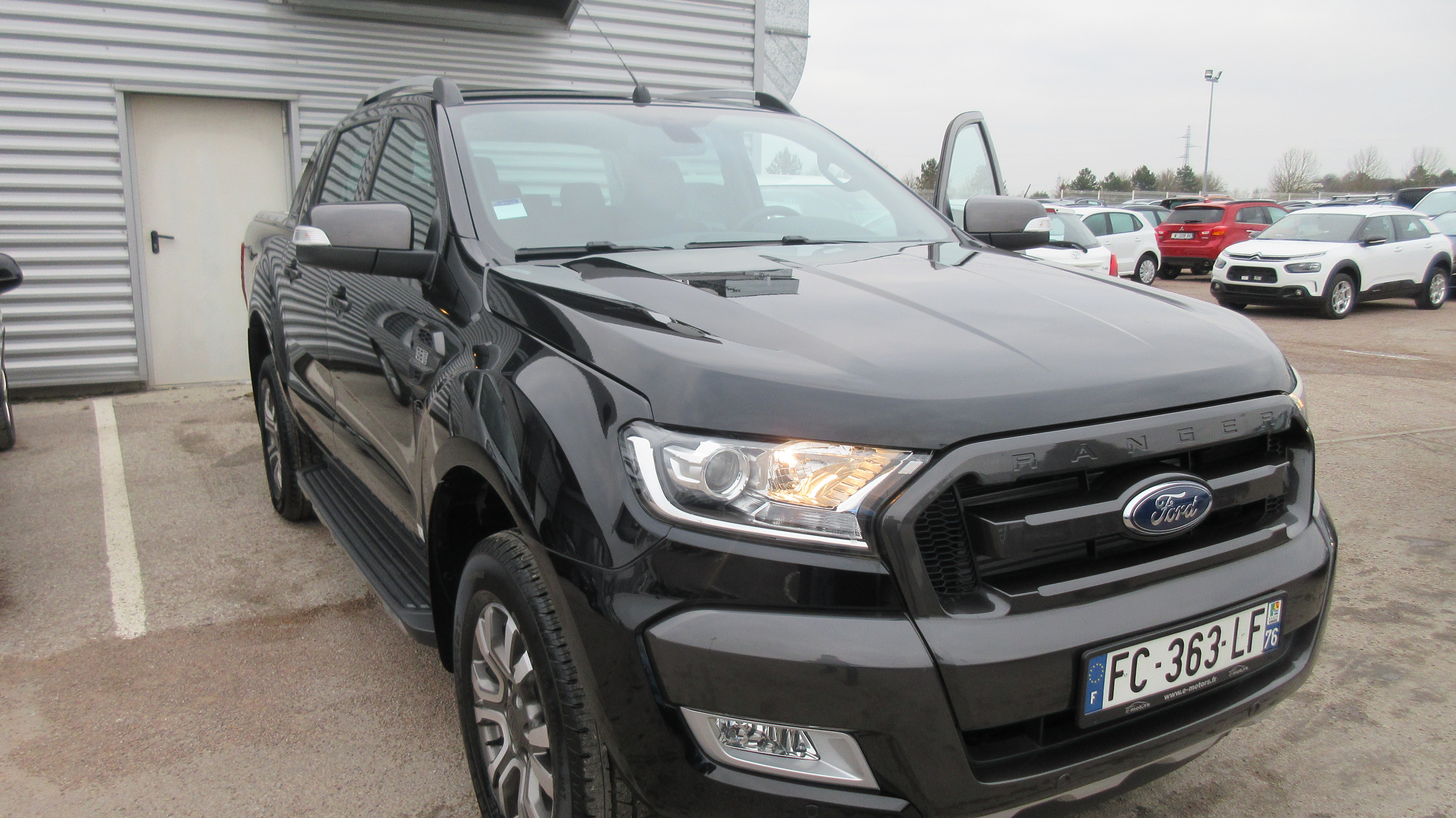 Avis-mandataire-auto-Emotors-Ford-Ranger-Double-cabine-wildtrak-tdci-200-4x4-automatique-plus-attelage-plus-rideau-plus-pack-offroad.